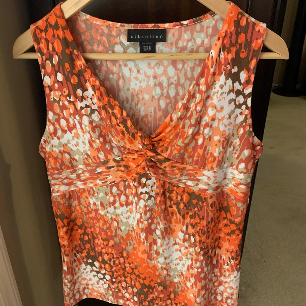 Orange multi-colored sleeveless top. Size M.